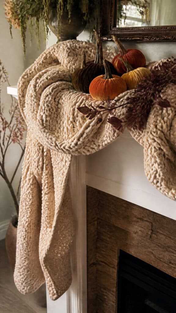 Chunky Knit Blanket Draped With Velvet Pumpkins
