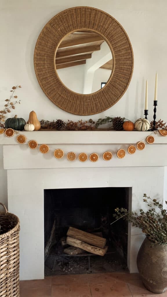 Rattan Mirror With Hanging Dried Oranges