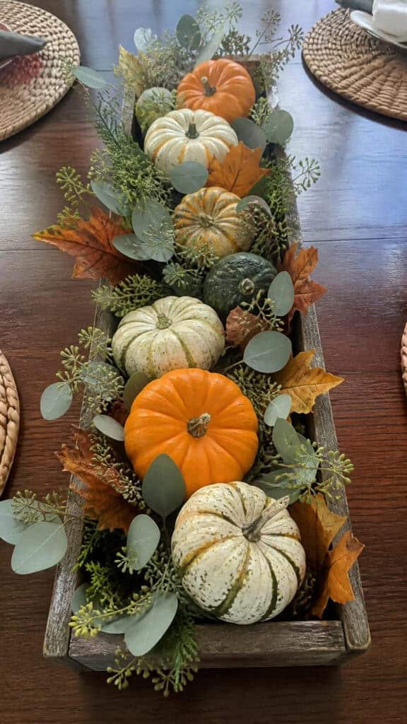 Rustic Wooden Box Filled with Mini Pumpkins and Greenery