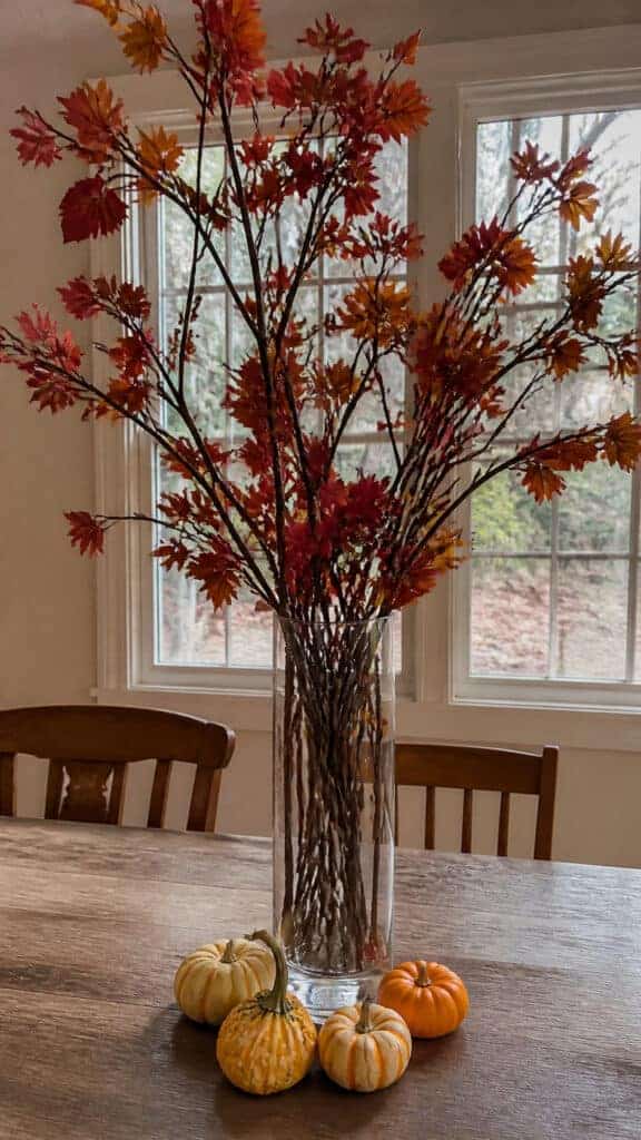 Simple Glass Vase with Fall Branches and Berries