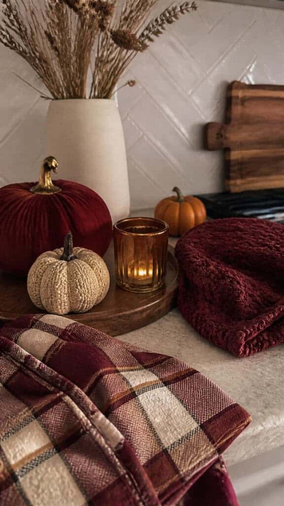 Incorporate Warm Colors and Cozy Textiles