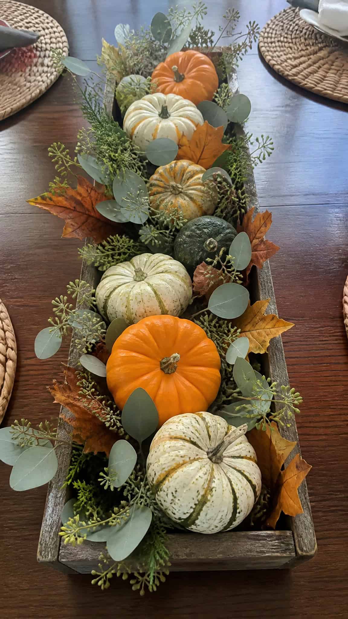 Rustic Wooden Box Filled with Mini Pumpkins and Greenery